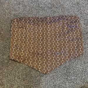 Strapless shirt, Color brown and white with designs, Size small, from holster.